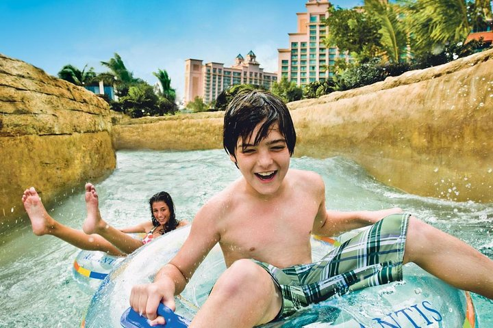 Experience the excitement of Aquaventure water park where laughter and splashes collide. Dive into a world of fun with exhilarating slides and an unforgettable aquatic adventure.